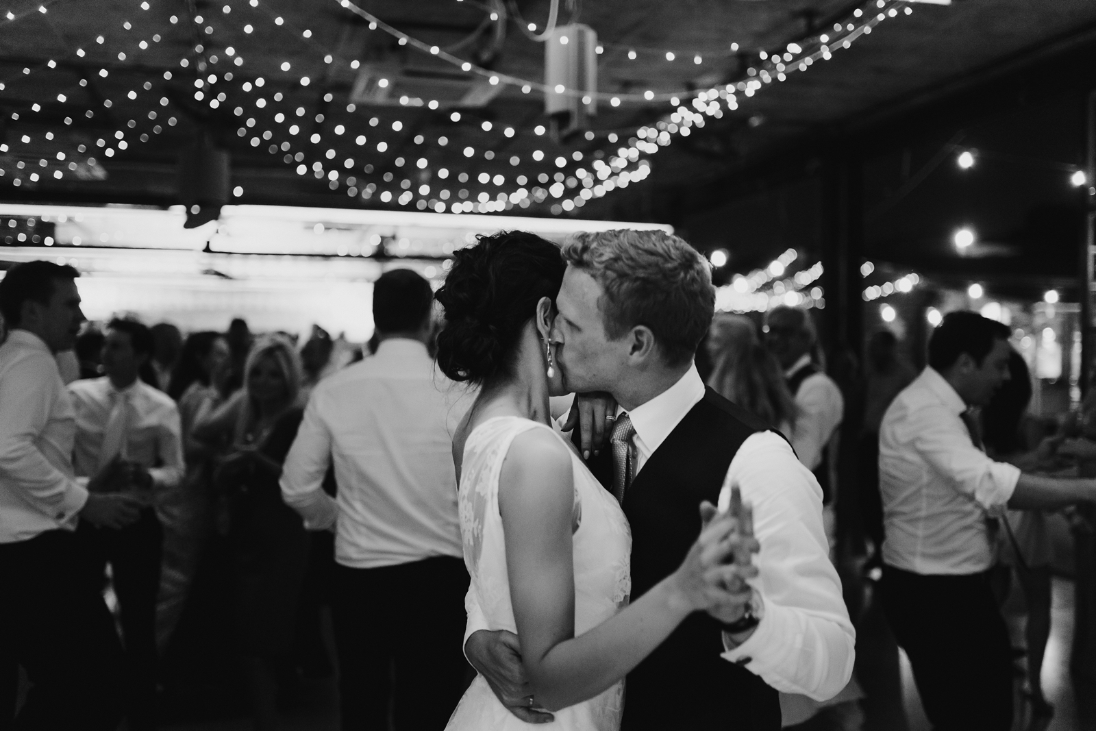 Couple dancing under fairy lights at Dorćol Platz
